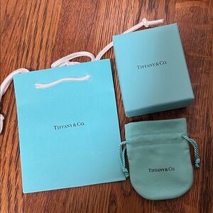 Bundle of three Tiffany & Co. bag, box and jewelry bag